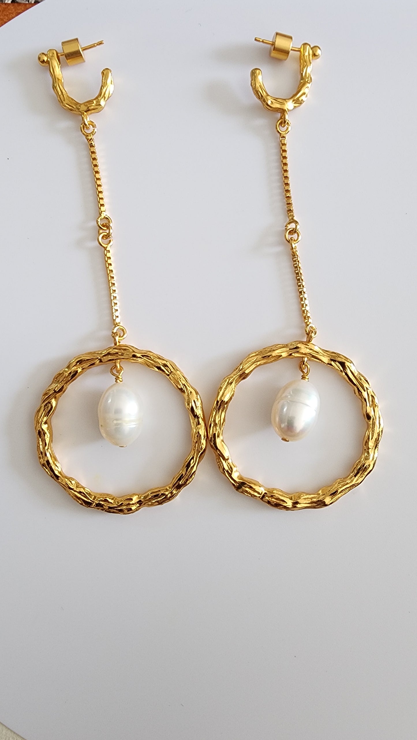 Dangling pearl hoop earrings